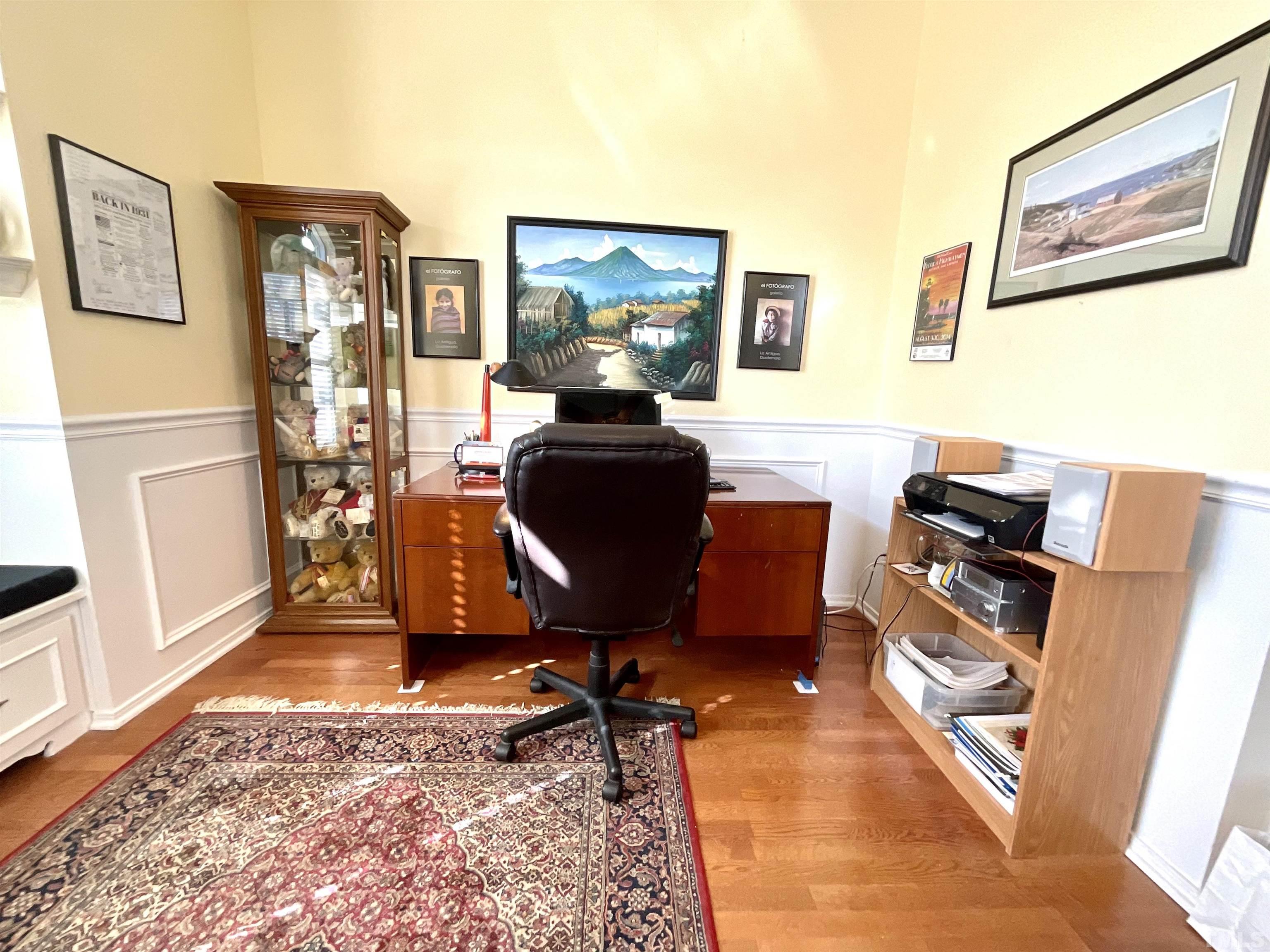 8400 Split Stone Lane Raleigh, NC 27613 - Photo 14 of 27 a view of a workspace with furniture and a window