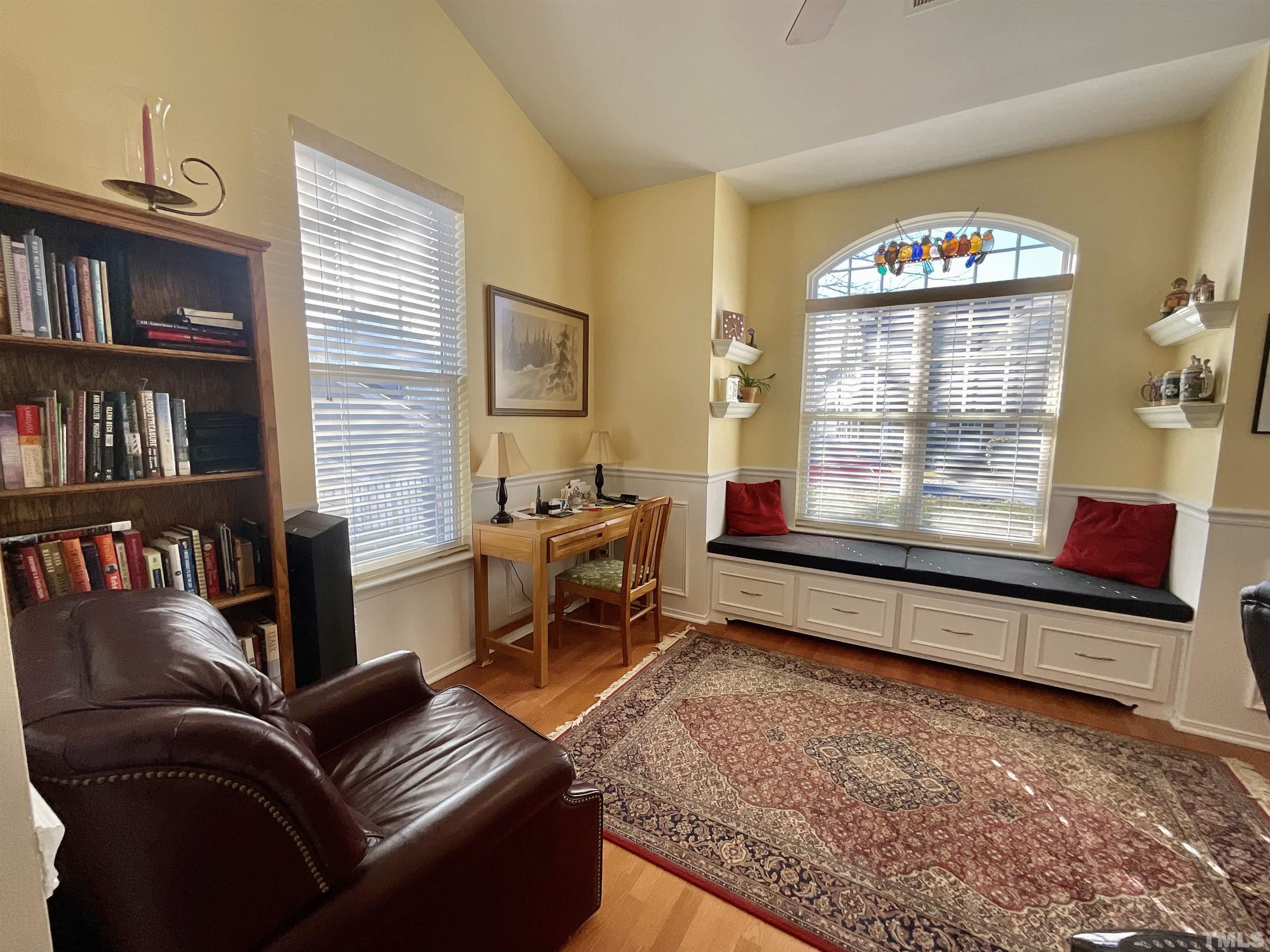 8400 Split Stone Lane Raleigh, NC 27613 - Photo 15 of 27 a living room with furniture cabinets and a window