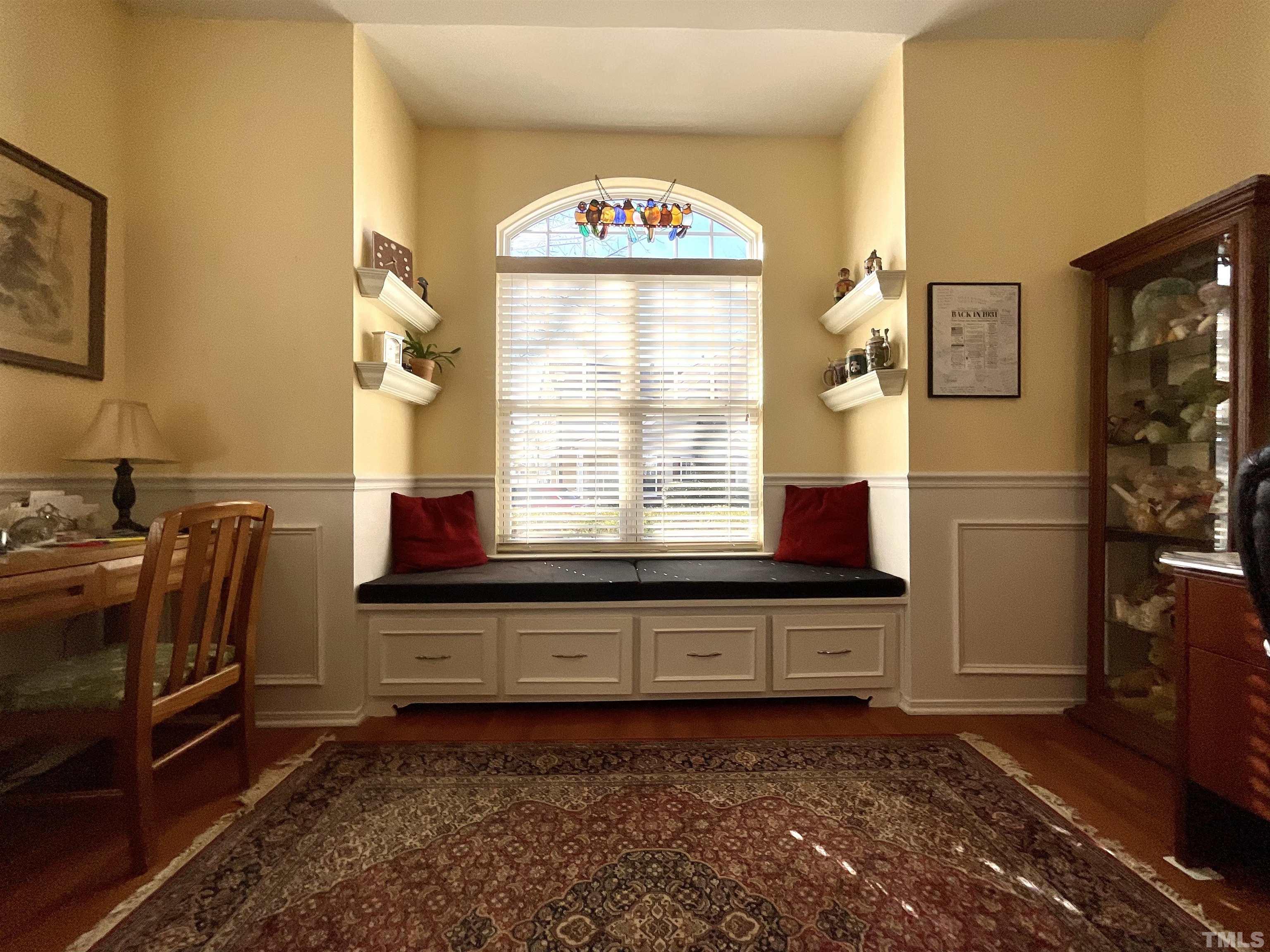 8400 Split Stone Lane Raleigh, NC 27613 - Photo 16 of 27 a view of a hallway with a large window