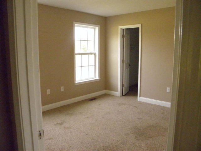 1218 Bowers Cemetery Road Cochran, GA 31014 - Photo 13 of 21 an empty room with windows and closet