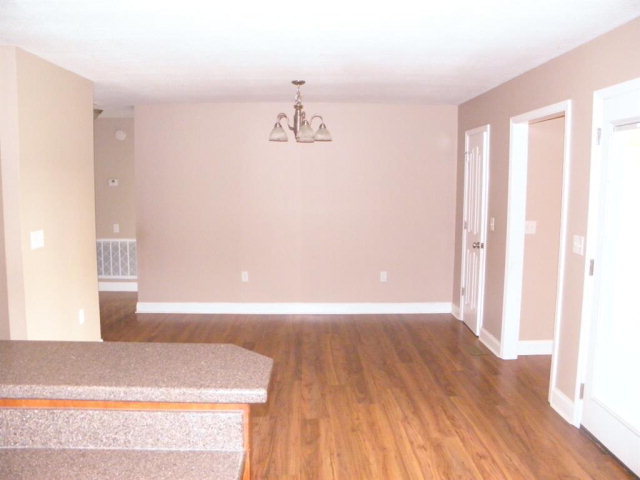 1218 Bowers Cemetery Road Cochran, GA 31014 - Photo 17 of 21 a view of a room with wooden floor
