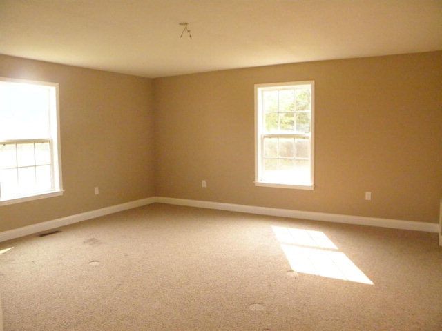 1218 Bowers Cemetery Road Cochran, GA 31014 - Photo 18 of 21 an empty room with a window