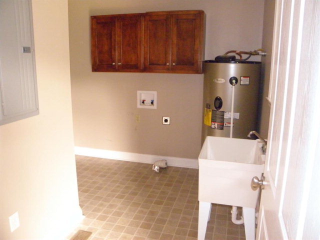1218 Bowers Cemetery Road Cochran, GA 31014 - Photo 8 of 21 a bathroom with a sink and a mirror