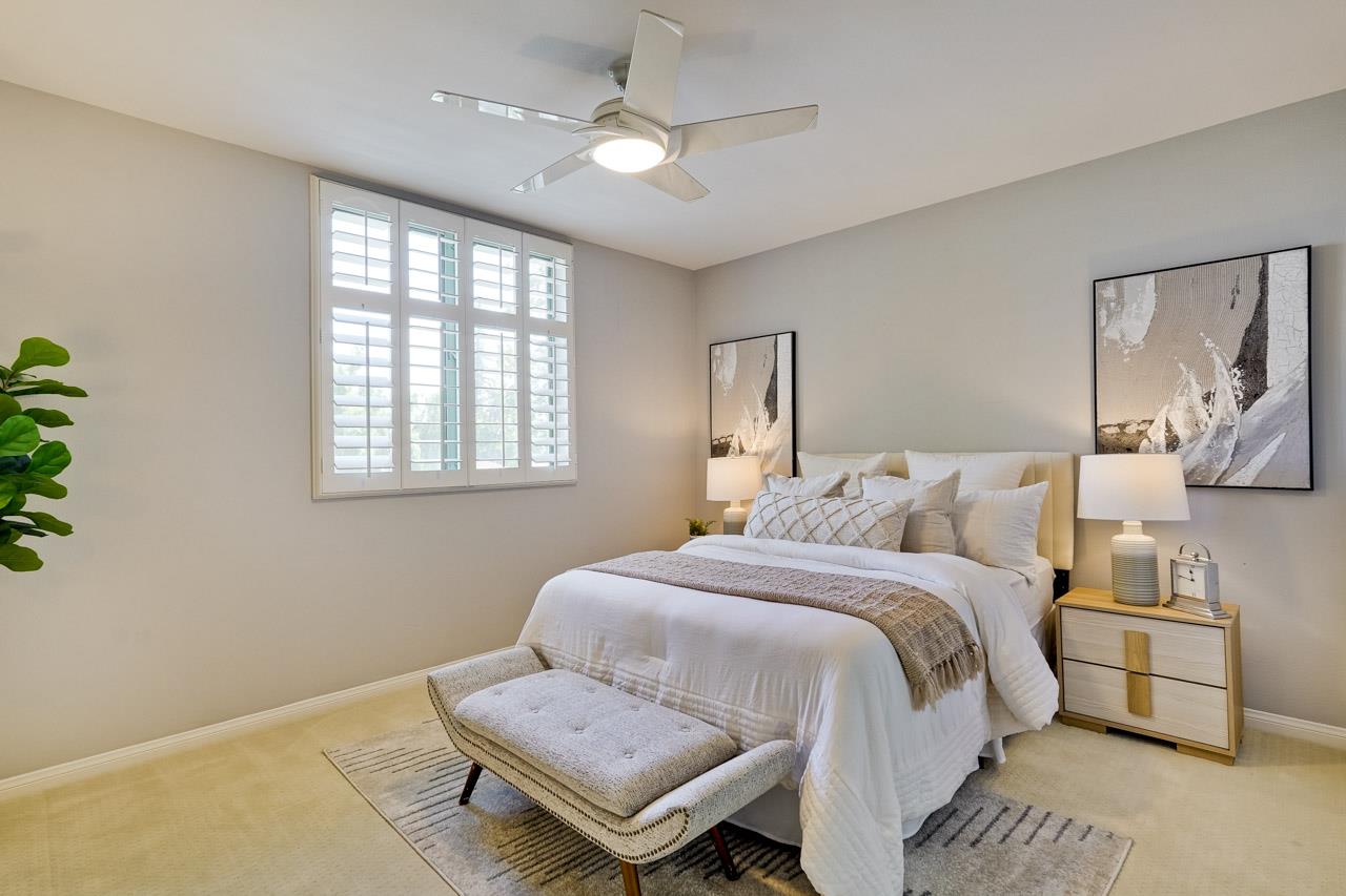 144 South 3rd Street, Unit 425 San Jose, CA 95112 - Photo 16 of 52 a bedroom with a bed and wooden floor