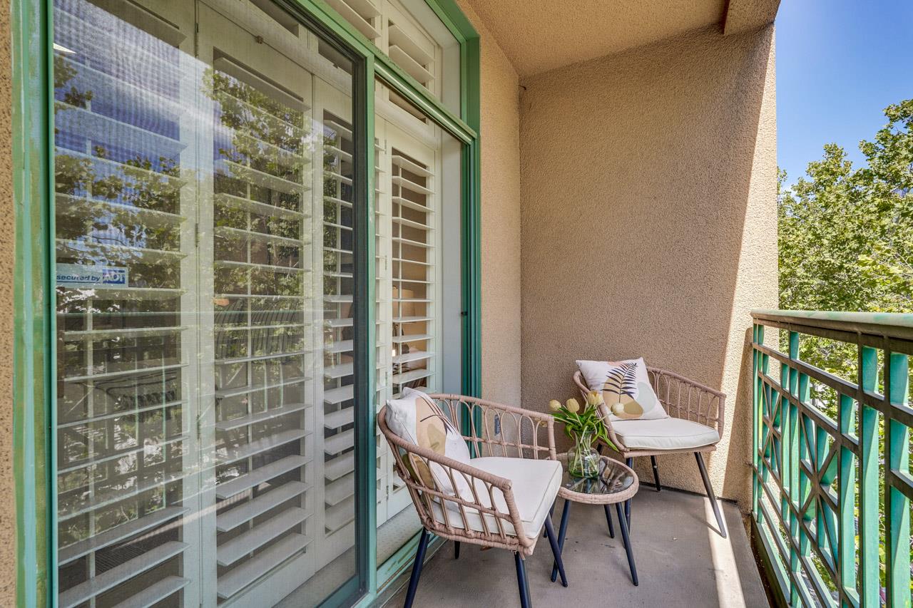 144 South 3rd Street, Unit 425 San Jose, CA 95112 - Photo 28 of 52 a balcony with table and chairs