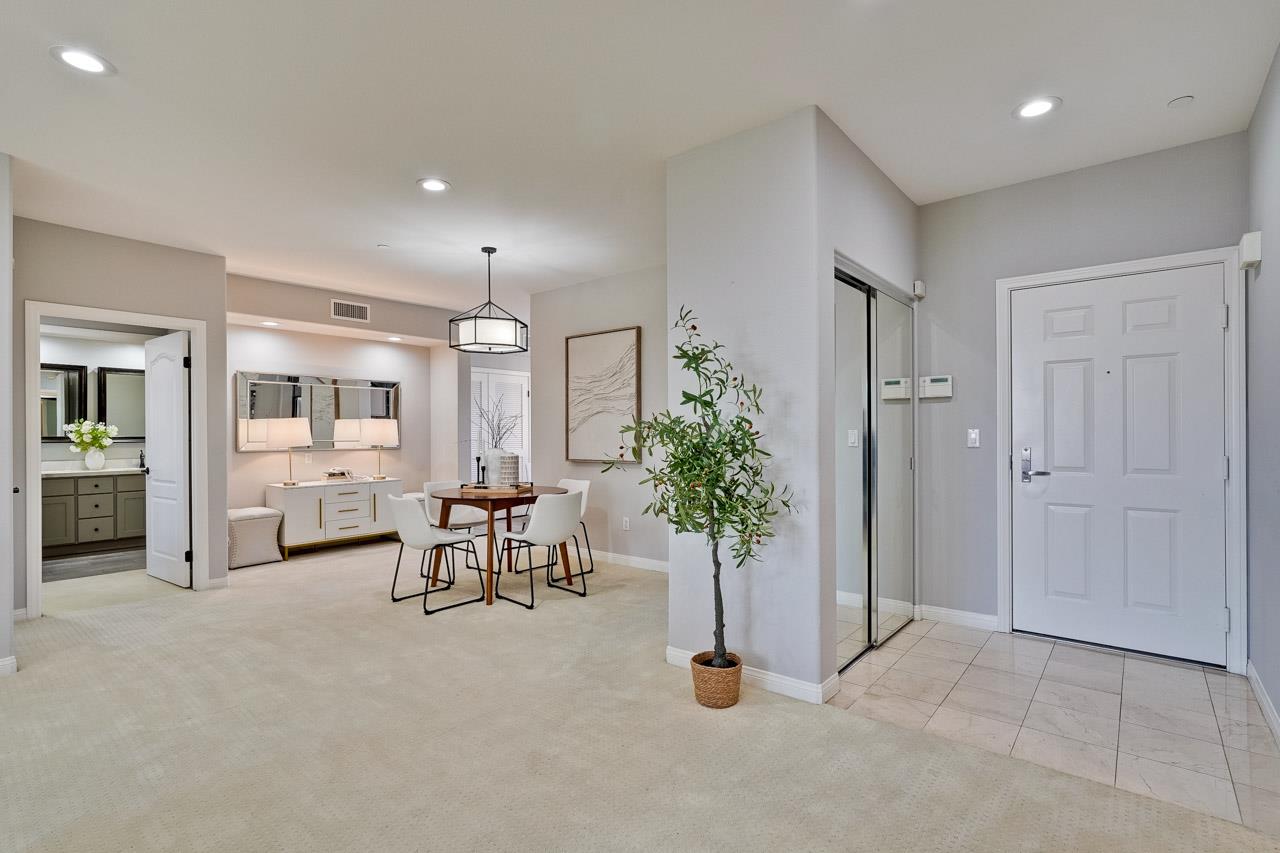 144 South 3rd Street, Unit 425 San Jose, CA 95112 - Photo 3 of 52 a living room with furniture and potted plants