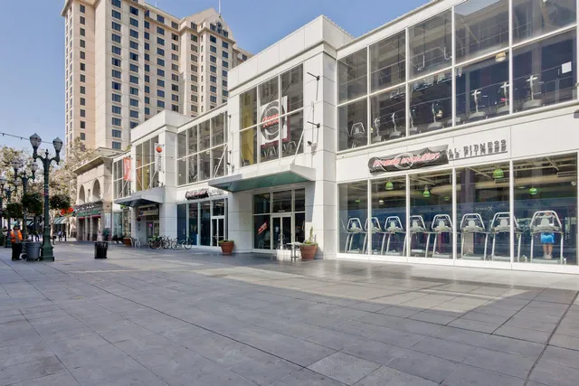 a view of a building with sitting area