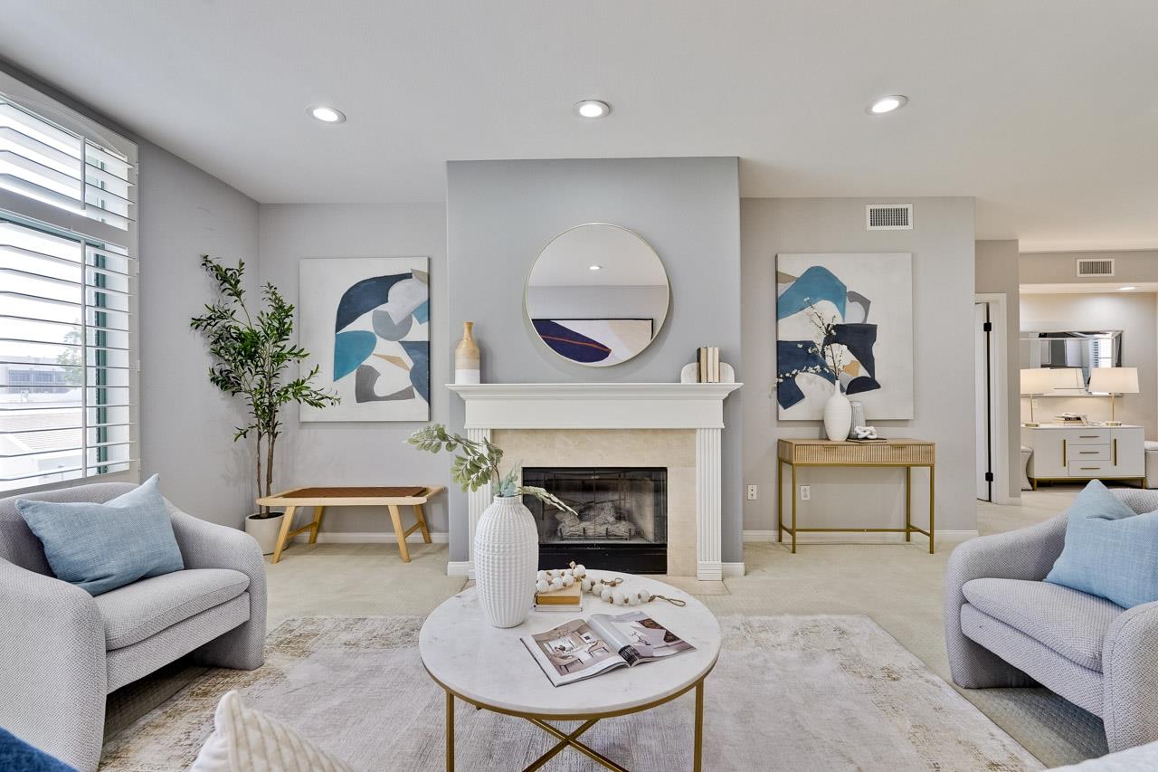 144 South 3rd Street, Unit 425 San Jose, CA 95112 - Photo 5 of 52 a living room with furniture and a fireplace