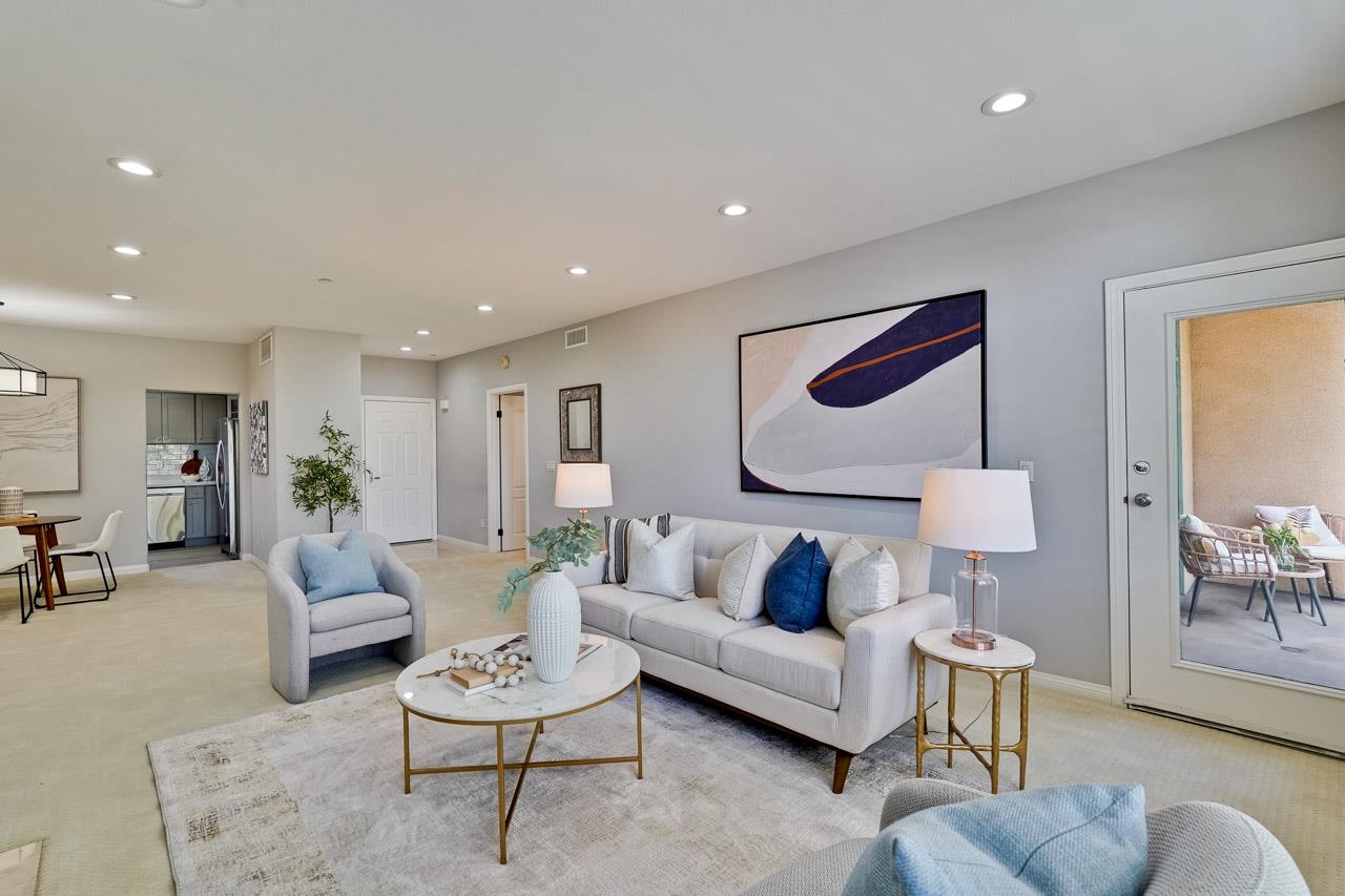 144 South 3rd Street, Unit 425 San Jose, CA 95112 - Photo 7 of 52 a living room with furniture and a potted plant