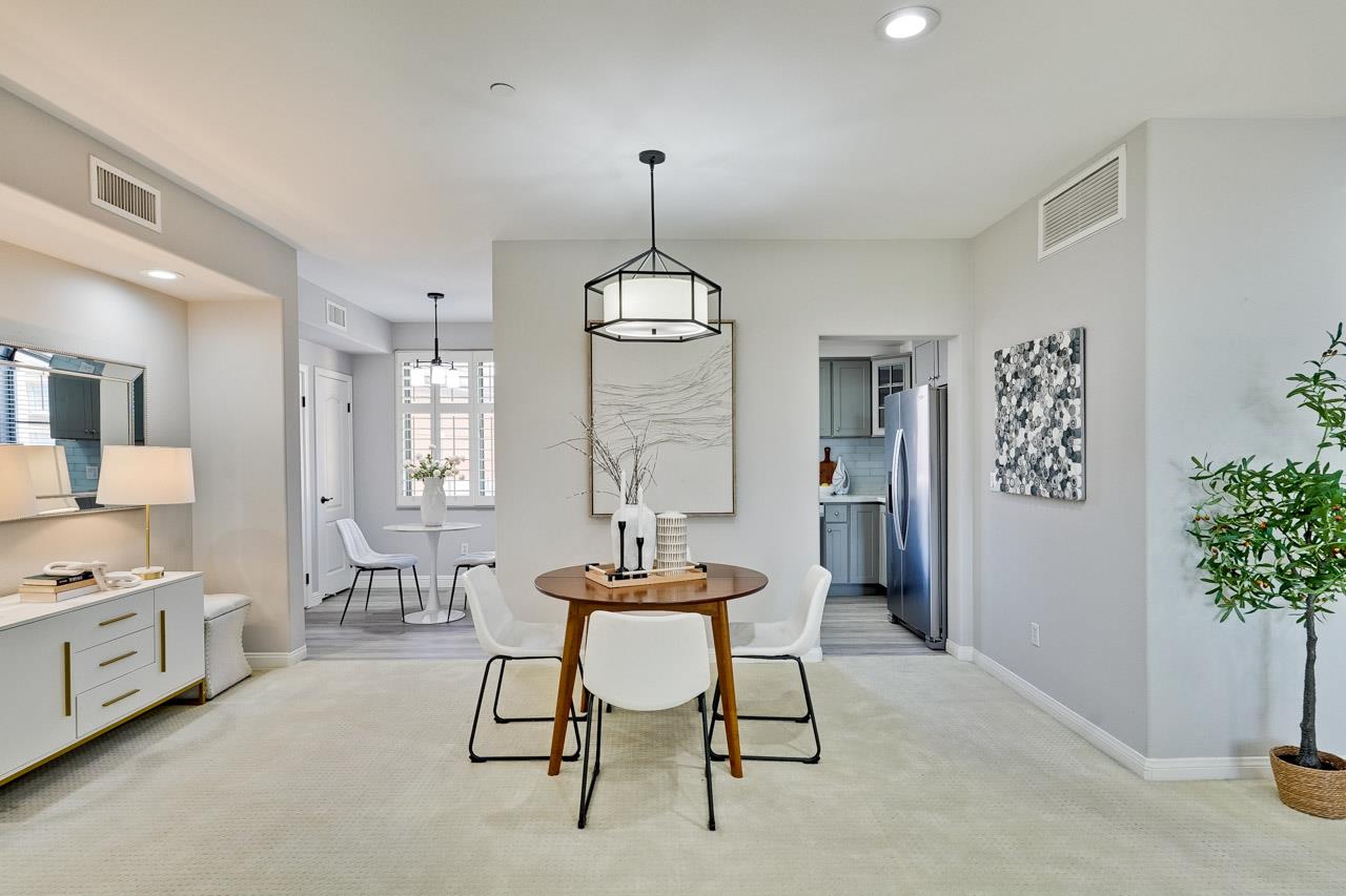 144 South 3rd Street, Unit 425 San Jose, CA 95112 - Photo 10 of 52 a view of a a dining room with furniture window and wooden floor