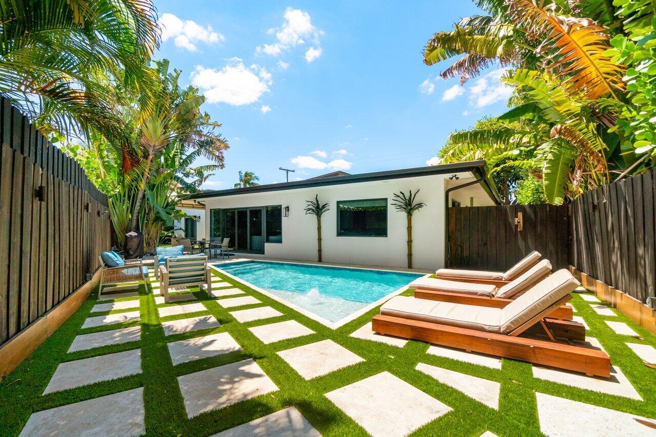 308 Enfield Road Delray Beach, FL 33444 - Photo 15 of 25 a view of swimming pool with lounge chair
