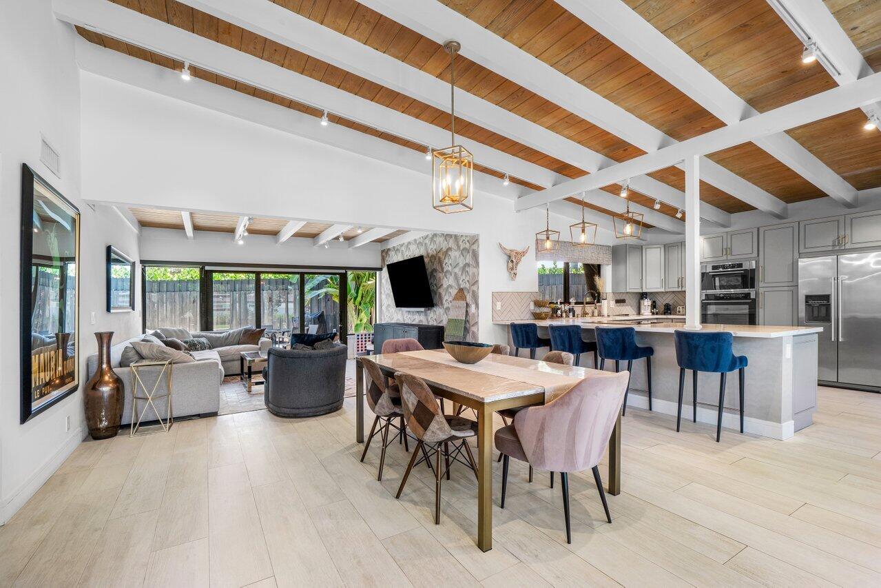 308 Enfield Road Delray Beach, FL 33444 - Photo 4 of 25 a view of a dining room with furniture window and outside view