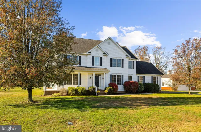 a view of a house with a swimming pool