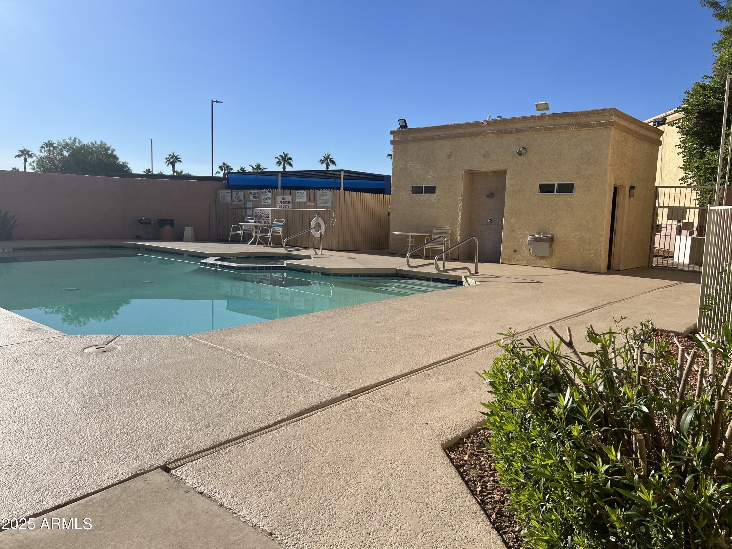 12221 West Bell Road, Unit 278 Surprise, AZ 85378 - Photo 21 of 24 a view of a back yard of the house