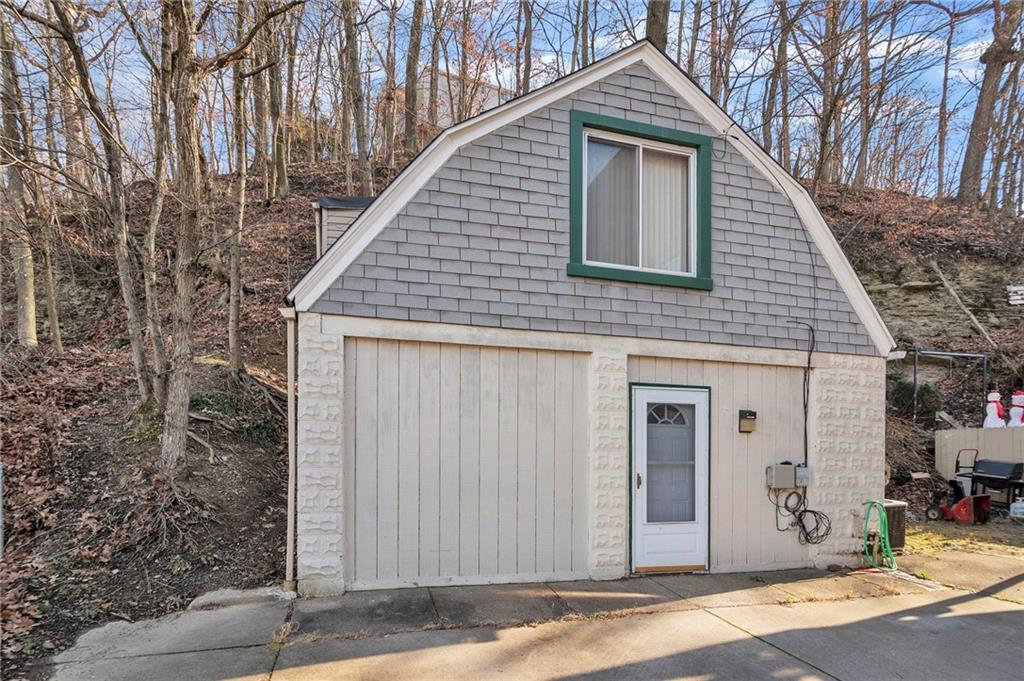 726 Evergreen Road Pittsburgh, PA 15209 - Photo 18 of 25 a front view of a house with a yard