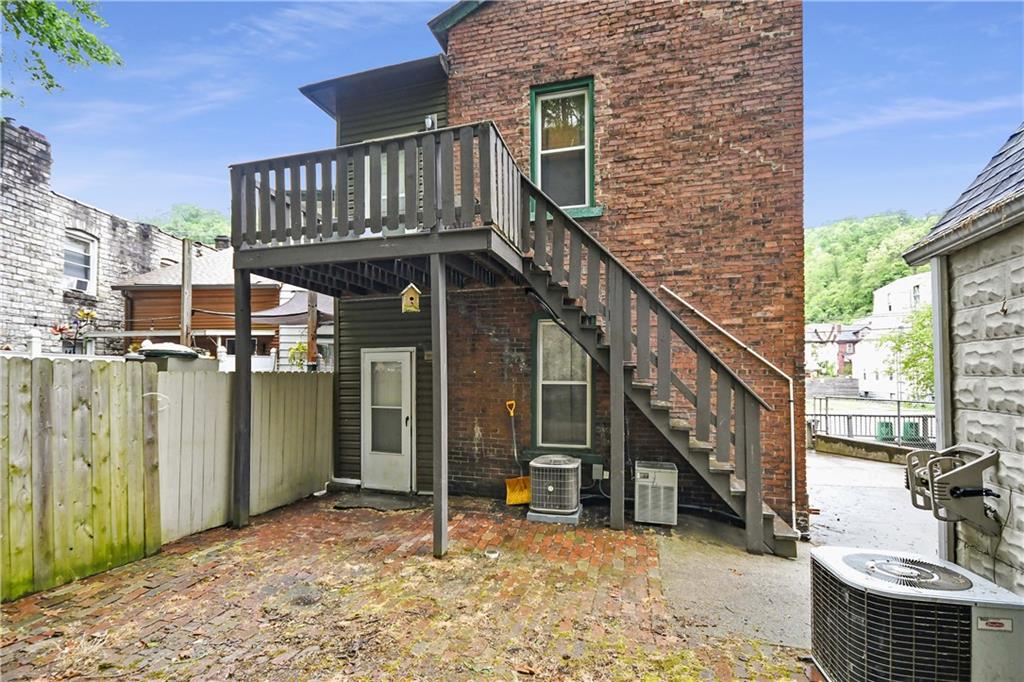 726 Evergreen Road Pittsburgh, PA 15209 - Photo 25 of 25 a view of a house with a balcony and door