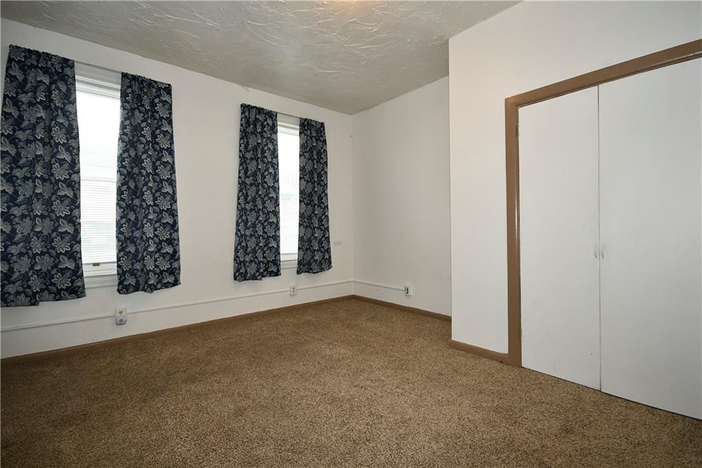 726 Evergreen Road Pittsburgh, PA 15209 - Photo 7 of 25 an empty room with windows