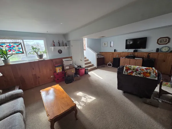a living room with furniture and a couch