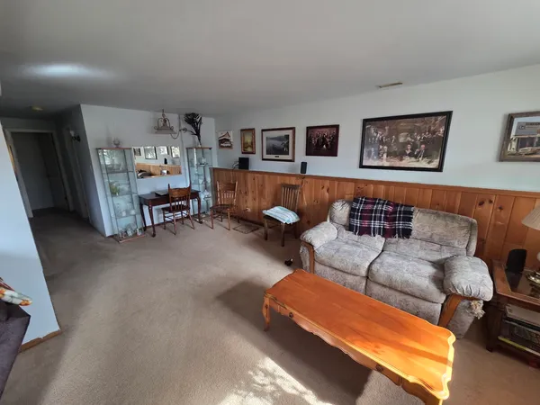 a living room with furniture and a couch