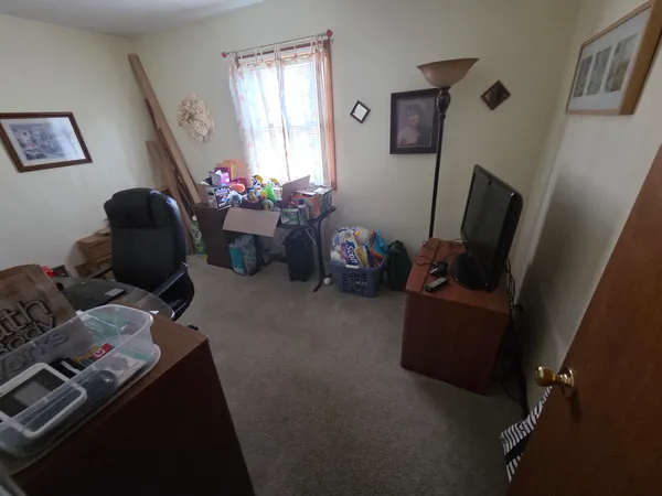 a room with furniture and a window