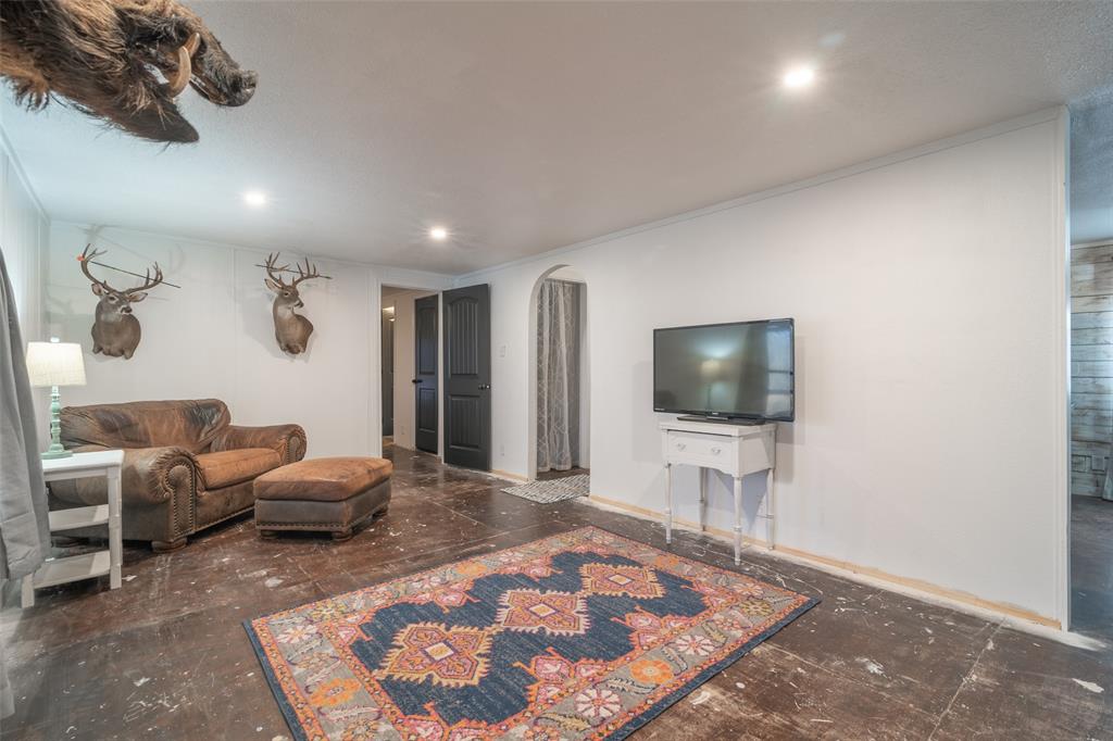 17540 Old George Drive Terrell, TX 75160 - Photo 15 of 28 a living room with furniture and a flat screen tv