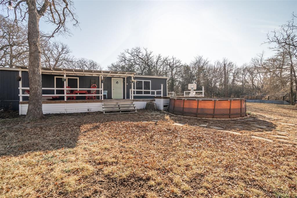 17540 Old George Drive Terrell, TX 75160 - Photo 25 of 28 a view of a backyard with large trees