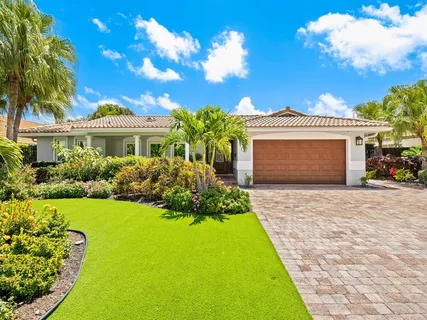 a view of a hallway with windows and couch