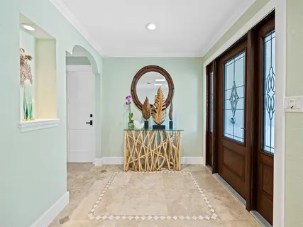 a kitchen with a sink stove and microwave