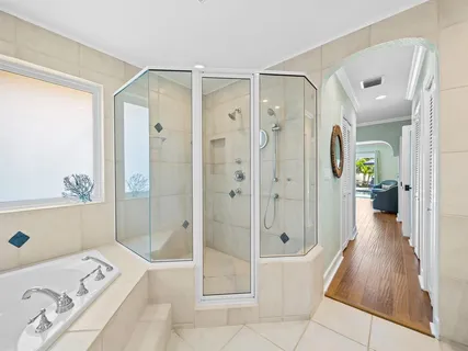 a en suite bathroom with a sink and a mirror