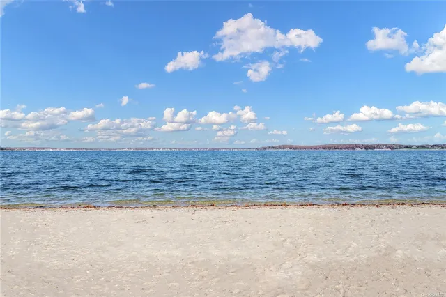 a view of a brick wall and a window