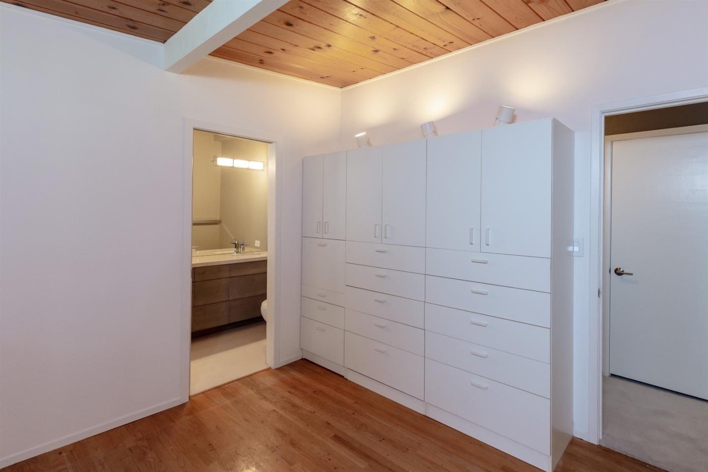 21661 Woolaroc Drive Los Gatos, CA 95033 - Photo 16 of 48 a view of a hallway a room with wooden floor and closet