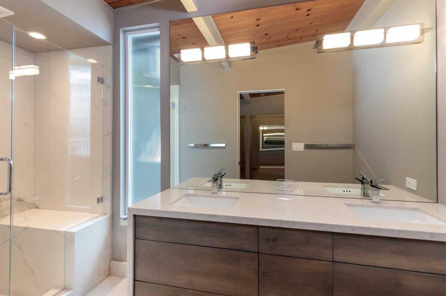 21661 Woolaroc Drive Los Gatos, CA 95033 - Photo 17 of 48 a bathroom with a sink and a mirror