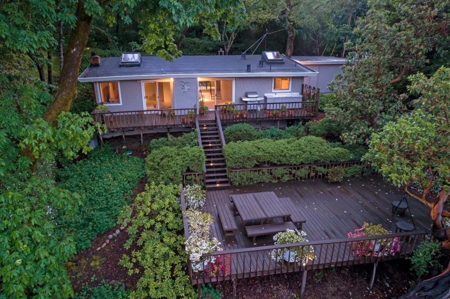21661 Woolaroc Drive Los Gatos, CA 95033 - Photo 34 of 48 a view of a house with brick walls and a pathway