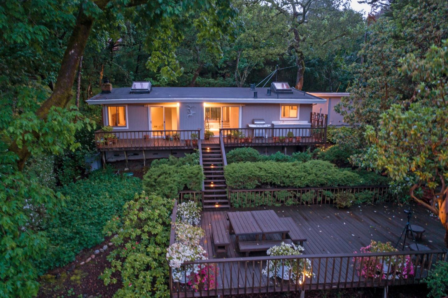 21661 Woolaroc Drive Los Gatos, CA 95033 - Photo 36 of 48 a view of a house with a yard and wooden fence