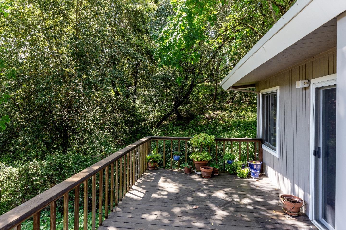 21661 Woolaroc Drive Los Gatos, CA 95033 - Photo 40 of 48 a view of a chair and table in the balcony
