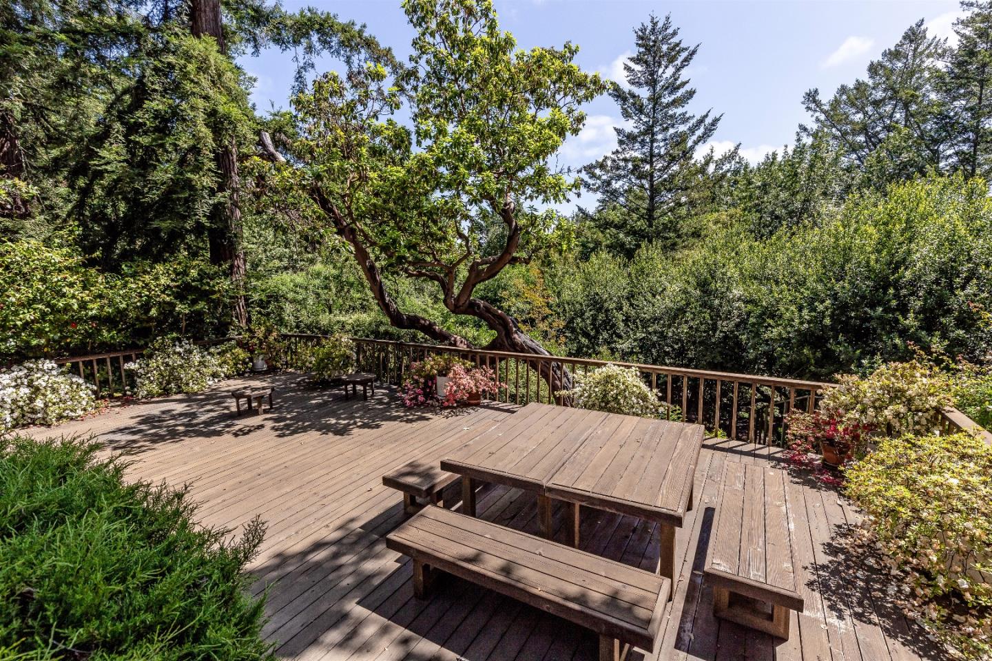 21661 Woolaroc Drive Los Gatos, CA 95033 - Photo 43 of 48 a view of a roof deck with couches and wooden fence