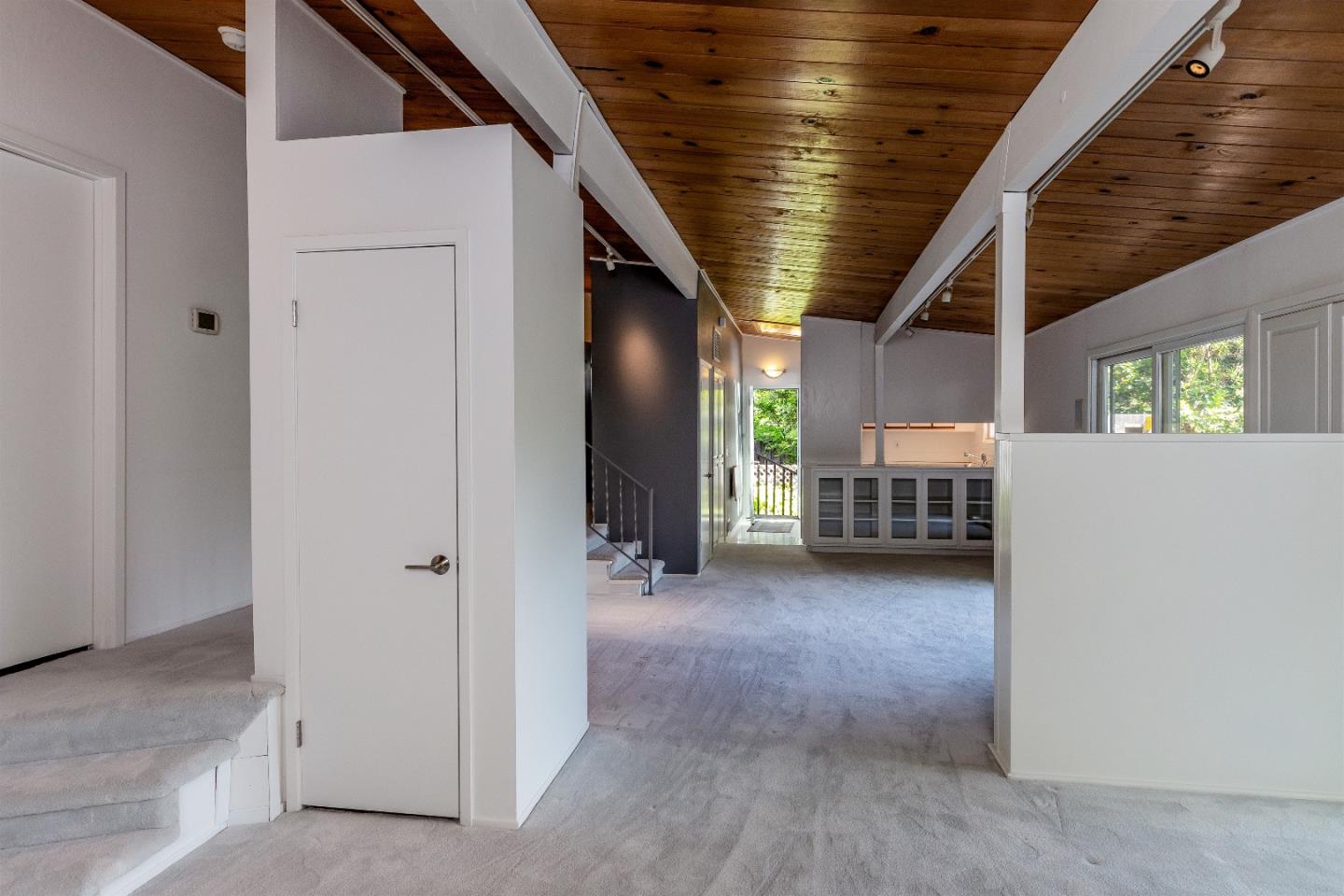 21661 Woolaroc Drive Los Gatos, CA 95033 - Photo 10 of 48 a view of a porch with furniture and a window
