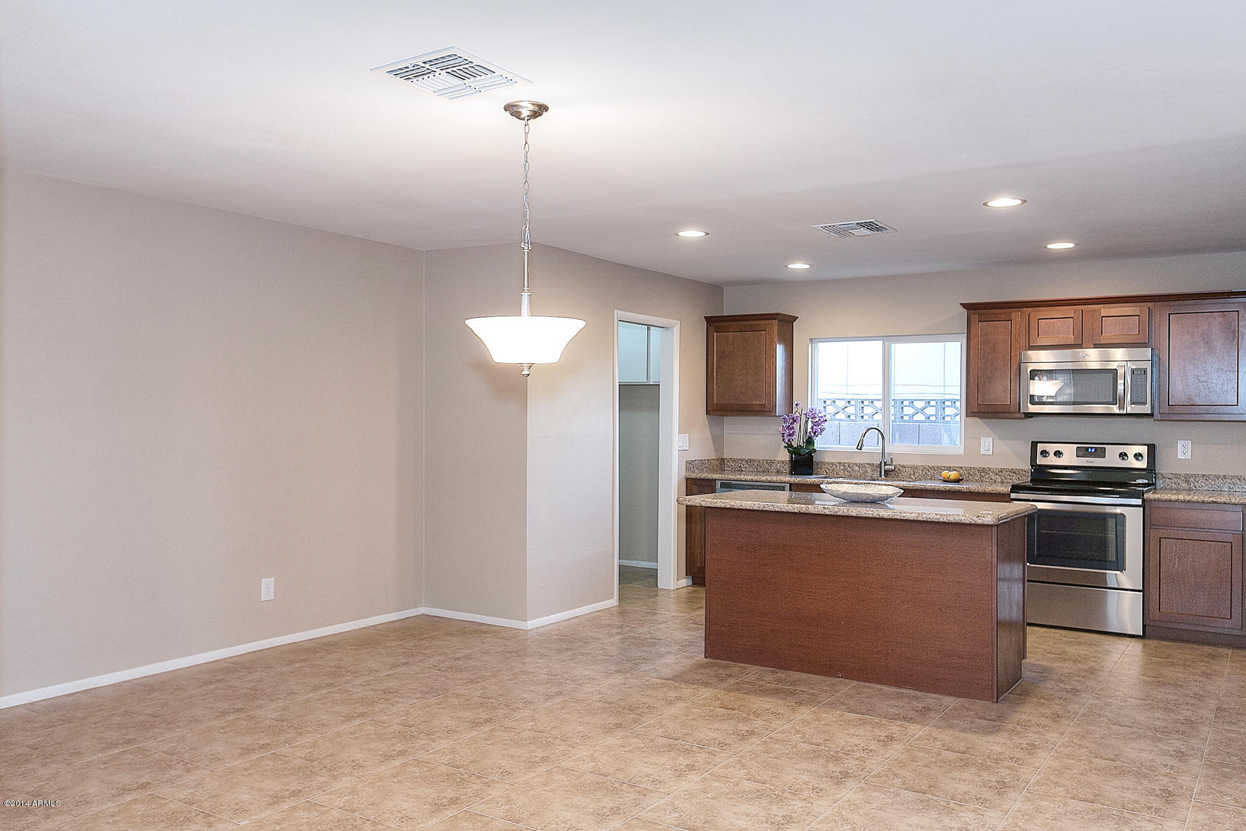 3919 West Rancho Drive Phoenix, AZ 85019 - Photo 12 of 27 Kitchen_Lg Center Island