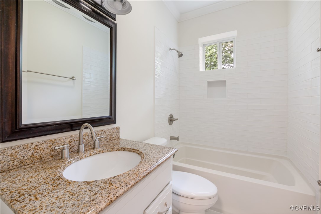 4593 Tabscott Road Columbia, VA 23038 - Photo 12 of 24 a bathroom with a granite countertop sink toilet and shower