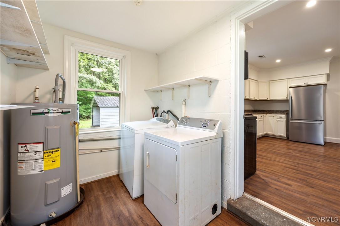 4593 Tabscott Road Columbia, VA 23038 - Photo 16 of 24 a kitchen with sink cabinets and wooden floor