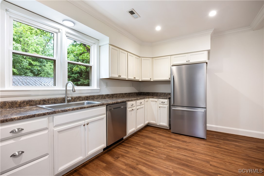 4593 Tabscott Road Columbia, VA 23038 - Photo 7 of 24 a kitchen with granite countertop stainless steel appliances a refrigerator sink and microwave