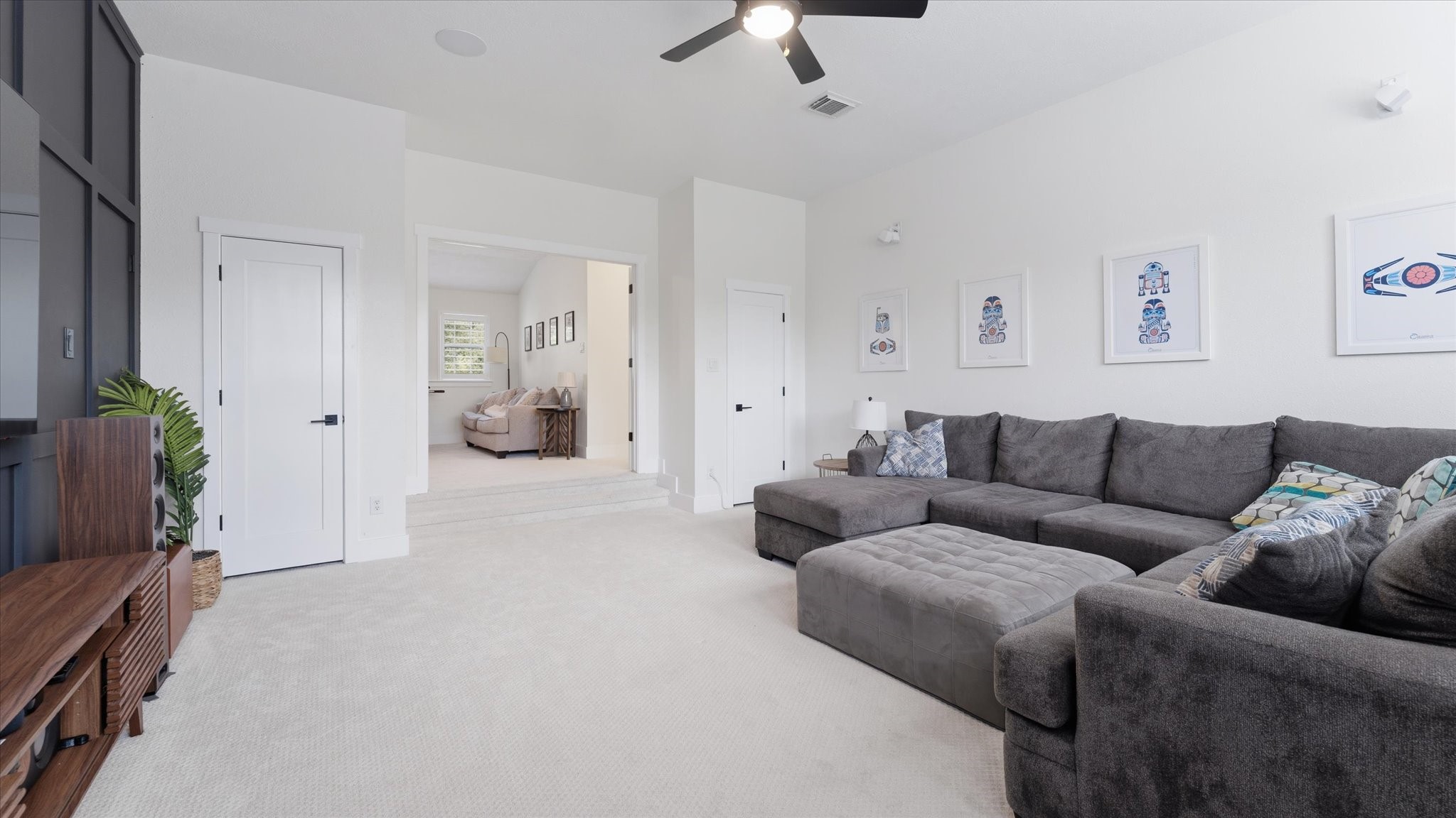 2 South Winsome Path Circle Spring, TX 77382 - Photo 32 of 47 a living room with furniture and a flat screen tv