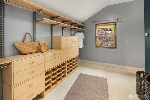 a bathroom with a sink toilet and mirror
