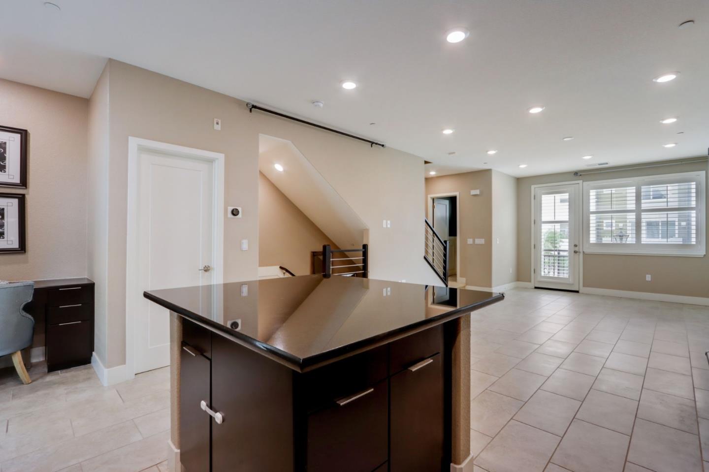 706 Ave One Drive San Jose, CA 95123 - Photo 11 of 60 a kitchen with counter top space and windows
