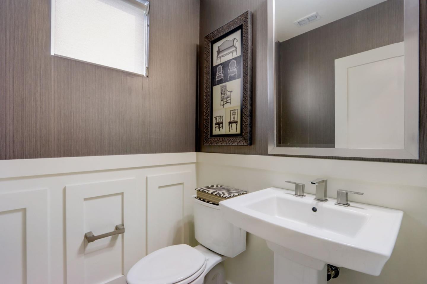 706 Ave One Drive San Jose, CA 95123 - Photo 14 of 60 a bathroom with a toilet sink and mirror