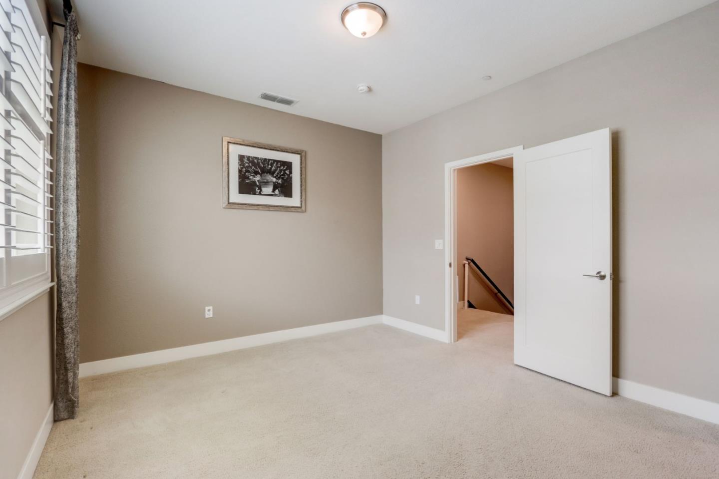 706 Ave One Drive San Jose, CA 95123 - Photo 17 of 60 an empty room with closet and a window