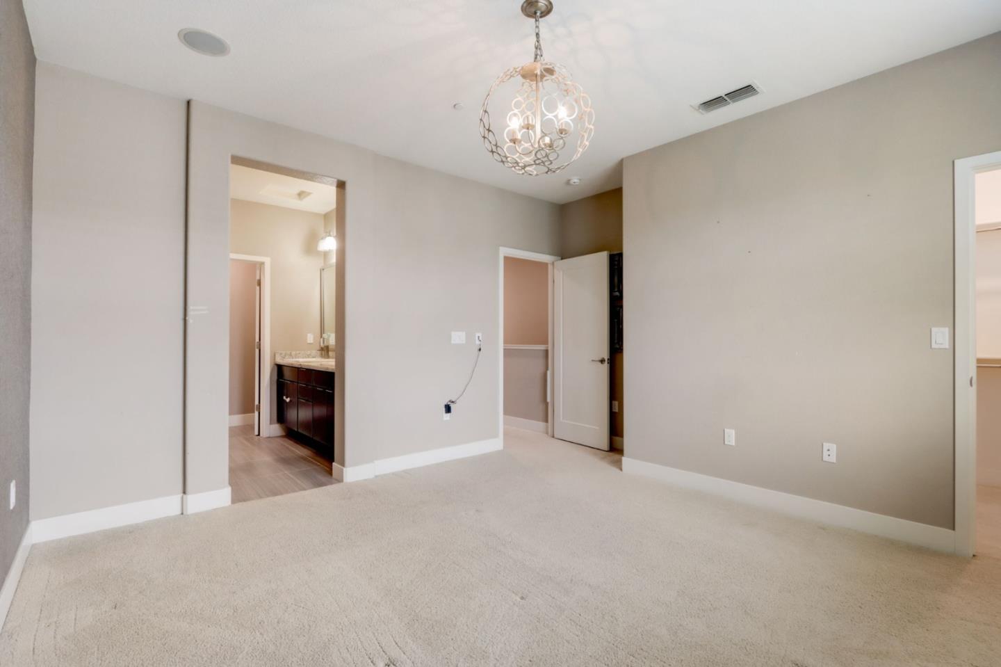 706 Ave One Drive San Jose, CA 95123 - Photo 22 of 60 en empty room with chandelier and entrance