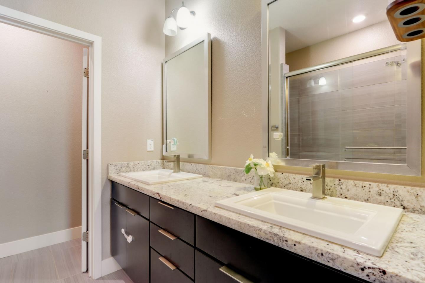 706 Ave One Drive San Jose, CA 95123 - Photo 24 of 60 a bathroom with a sink double vanity and a mirror