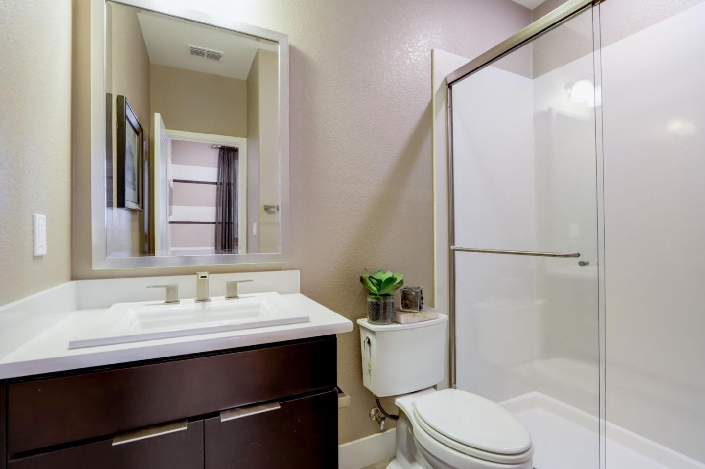 706 Ave One Drive San Jose, CA 95123 - Photo 27 of 60 a bathroom with a sink a toilet and shower