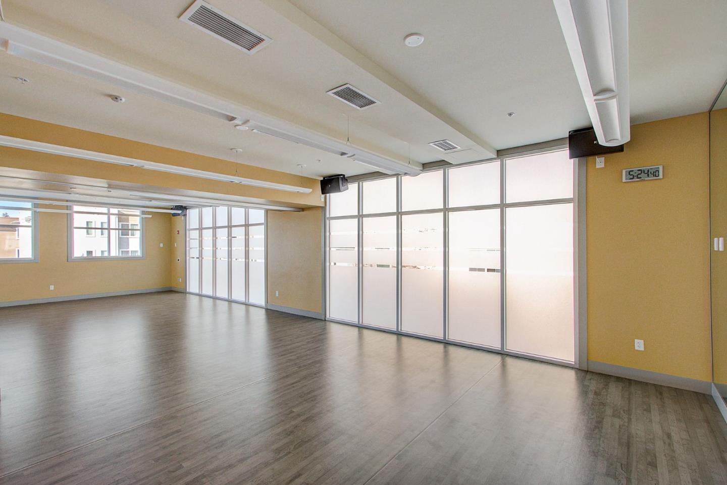 706 Ave One Drive San Jose, CA 95123 - Photo 28 of 60 a view of an empty room with wooden floor and a window